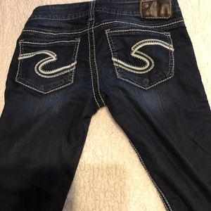 Silver bootcut jeans. NWOT . Never worn .
